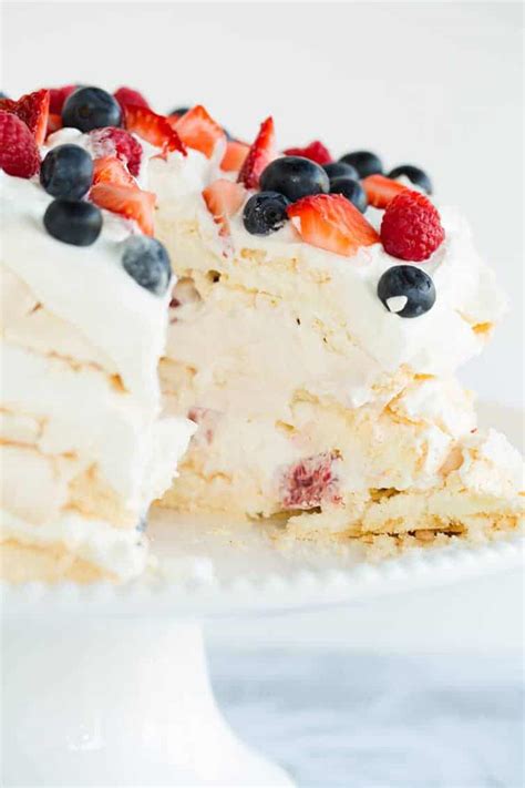 Pavlova Layer Cake with Whipped Cream & Berries | Brown Eyed Baker