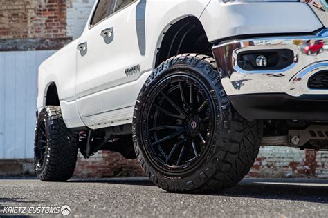 Lifted 2019 Ram 1500 with 22×12 Fuel Rebel Wheels and 6 inch Rough Country Suspension lift Kit ...