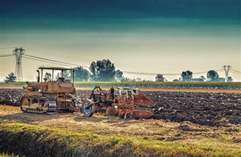 Old Tractor Plowing a Field Stock Photo - Image of countryside, agricultural: 70757642