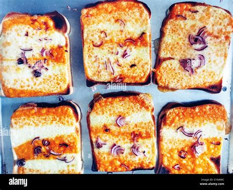 Cheese on toast with onion Stock Photo - Alamy