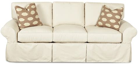 Klaussner Patterns Slipcovered Sofa with Rolled Arms and Tailored Skirt | Wayside Furniture | Sofas