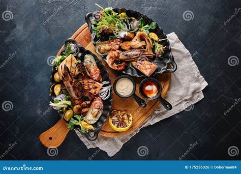 Grilled Seafood Platter. Assorted Delicious Grilled Seafood with Vegetables Stock Photo - Image ...