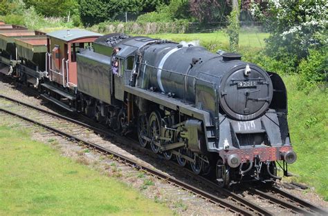 Locomotive #92214, of Britain's last class of steam locomotives, "9F," operates with a ...