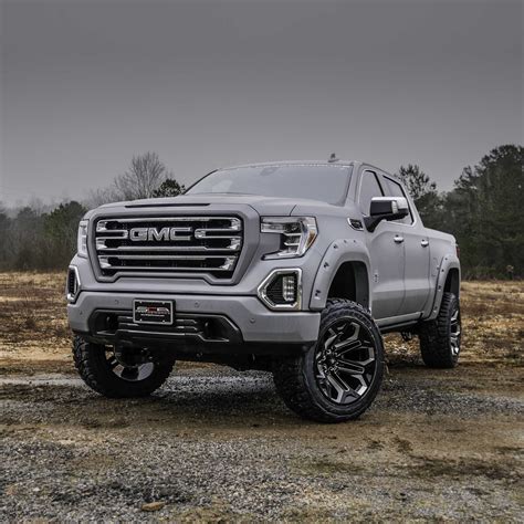 GMC BLACK WIDOW LIFTED TRUCKS — SCA Performance | Black Widow Lifted Trucks