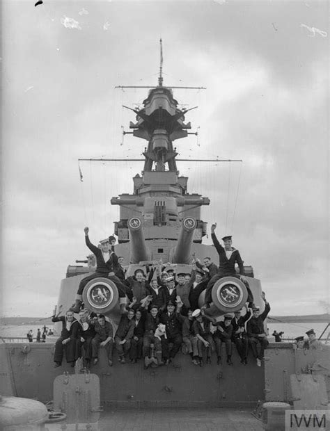 Some of the crew of HMS Hood with 'Bill', the Bull terrier mascot, 1940 From the Imperial War ...