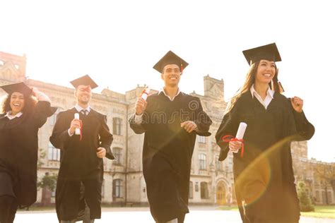 Happy Students with Diplomas. Graduation Ceremony Stock Photo - Image of bachelor, education ...