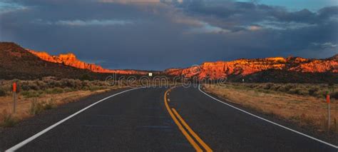 Sunset over a desert road stock photo. Image of desert - 22397240