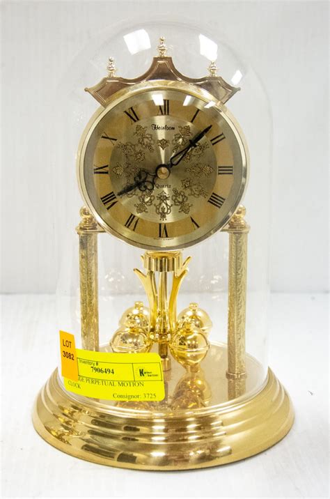 VINTAGE PERPETUAL MOTION CLOCK