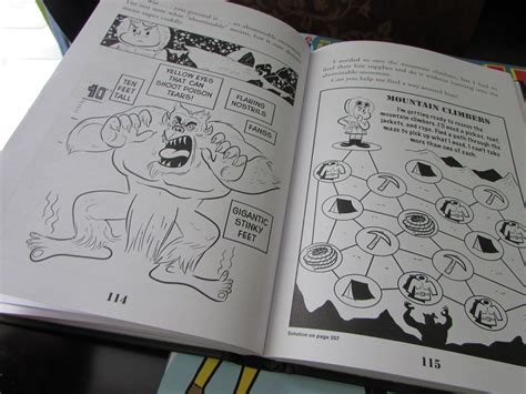 an open book with cartoon pictures on it