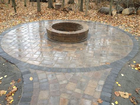 Fire Pit in the woods...Brick paver patio and tumbled paver stone fire pit. All Natural ...