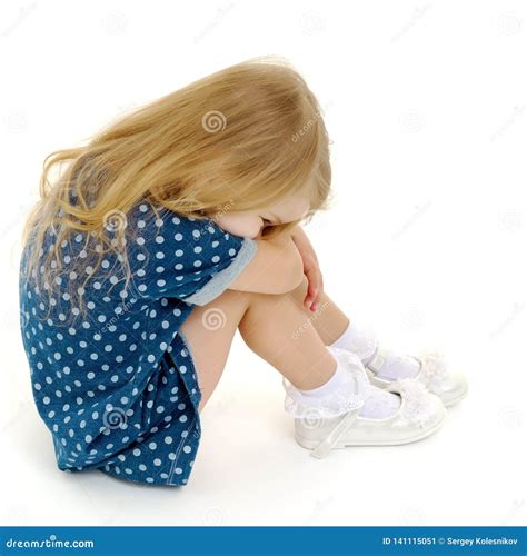 The little girl is crying. stock image. Image of fear - 141115051