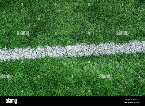 Photo of the details of football field with artificial grass Stock Photo - Alamy