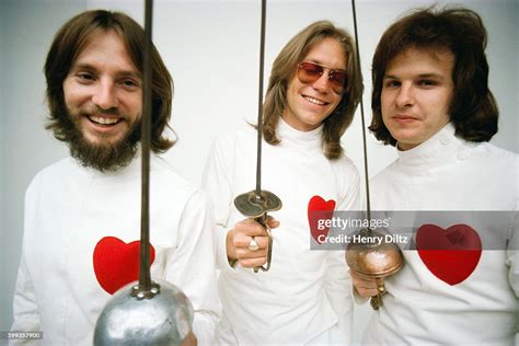 America band members Dewey Bunnell, Gerry Beckley, and Dan Peek stand... News Photo - Getty Images