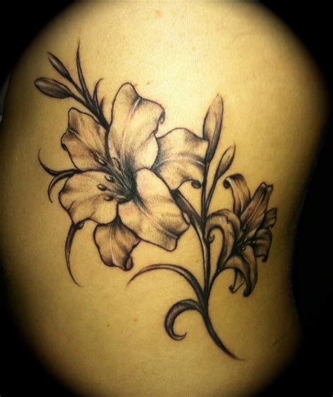 Aiz Tattoo Gallery: Black Flower Tattoo for Girls | Girls Flowers Tattoos