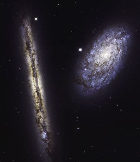 Hubble's Celebrates 27th Anniversary with Image of Spiral Galaxies NGC 4302 and NGC 4298