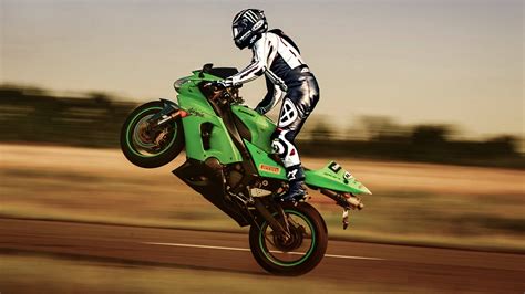 Download Green Ktm 4k Bike Stunt Wallpaper | Wallpapers.com