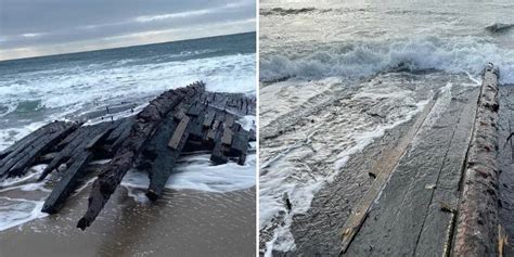 shipwreck uncovered by erosion on the sandy shore near Cape Ray Gordon ...