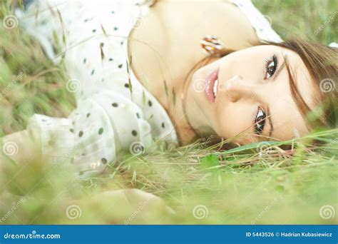 Beautiful Girl Lying Down of Grass Stock Photo - Image of escapism, freshness: 5443526