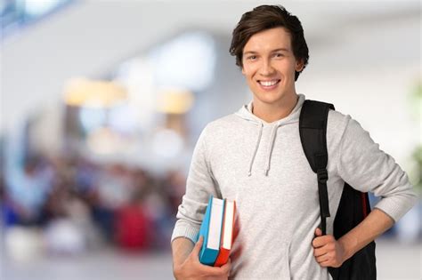 Premium Photo | Male student with backpack on background