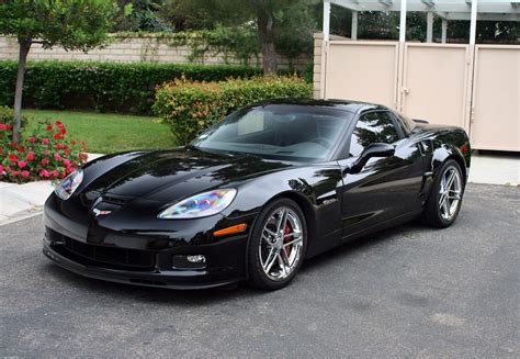 Z06 Picture request:Lowered Black C6 Z06 w/factory chromes ...