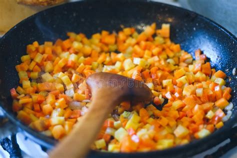 Chopped carrots frying stock photo. Image of carrot - 118389376