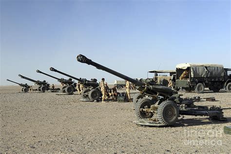 Howitzer 105mm Light Guns Are Lined Photograph by Andrew Chittock