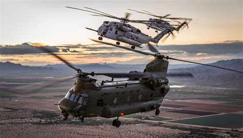 RAF CH-47 Chinook and two USMC CH-53 Sea Stallions fly together, Yuma ...