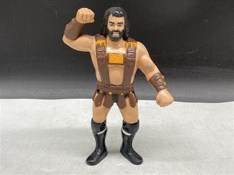 Urban Auctions - VINTAGE HERCULES HERNANDEZ WWF 1987 RUBBER WRESTLER ACTION FIGURE (8”)