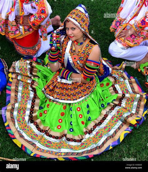 Indian girls practice the Garba dance steps in preparation for the Navratri festival in ...