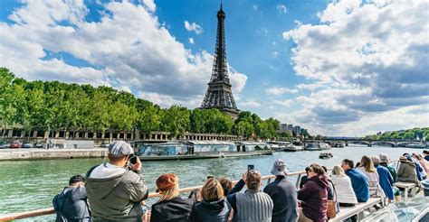 Paris: Eiffel Tower Guided Tour and Seine River Cruise | GetYourGuide