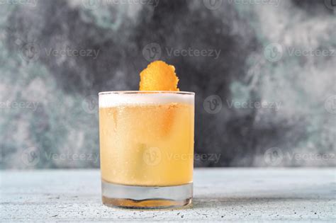 Glass of whiskey sour 5462992 Stock Photo at Vecteezy