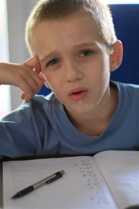 Boy writing homework stock image. Image of think, write - 781485