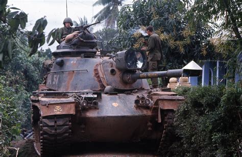 An M48 Patton tank makes its way through the streets of Hue, Republic of Vietnam in 1968. [2000 ...