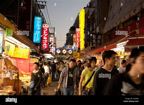 BUSY STREET MARKET AT NIGHT IN UENO OKACHIMACHI, TOKYO , JAPAN Stock Photo - Alamy