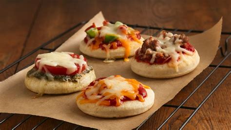 Mini Pizzas Recipe - Tablespoon.com