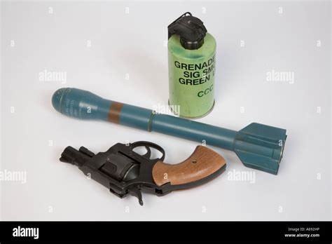 rocket propelled grenade, smoke grenade, pistol and revolver Stock Photo - Alamy