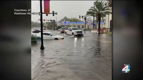 Car left submerged in San Marco flood waters after strong storms moved across area