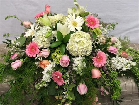 Pretty & Pink Casket Spray in Saint Charles, MO | Parkview Gardens Florist & Greenhouses