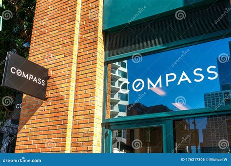 Compass Real Estate Agency Sign at the Brokerage Company Office in Downtown Editorial Photo ...