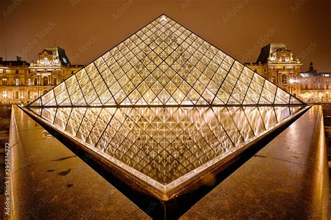 Night view of Louvre Art Museum, Paris, France. Stock Photo | Adobe Stock