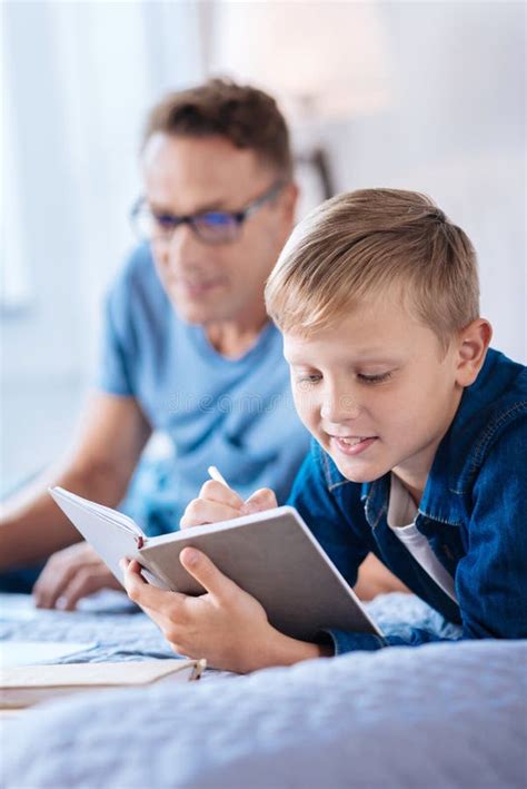 Charming Little Boy Writing in His Diary Stock Photo - Image of bedroom, parent: 100115352