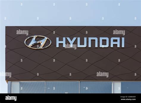 Hyundai logo on car dealership building - Hyundai is a South Korean multinational car ...