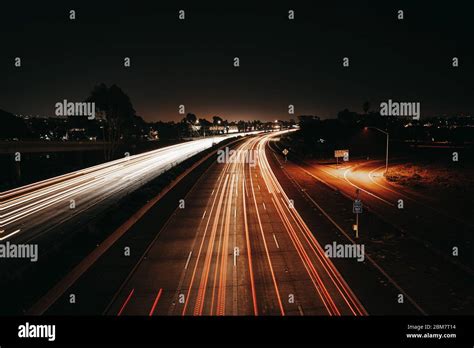 US highway at night Stock Photo - Alamy