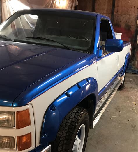 Custom paint job chevy silverado. Has red pinstripe and all inlaid graphics. By Jason Perry ...