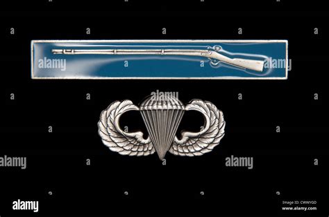 US Army Combat Infantry Badge (CIB) and Airborne badge on black Stock Photo: 50357565 - Alamy