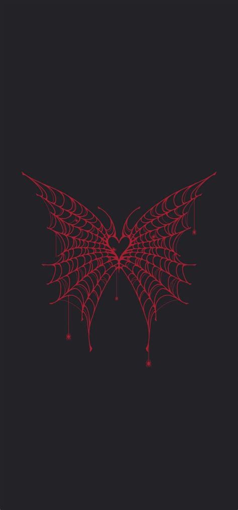 a red spider web on a black background