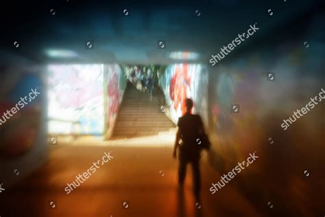 Man Walking Dark Tunnel Graffiti Symbolic Editorial Stock Photo - Stock Image | Shutterstock