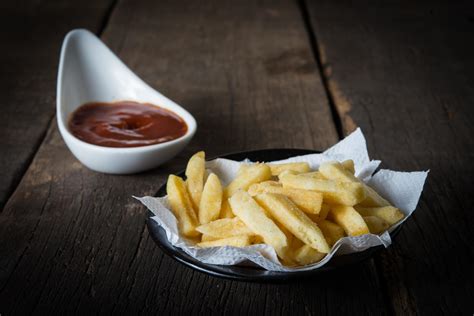 Traditional french fries with ketchup 1816940 Stock Photo at Vecteezy