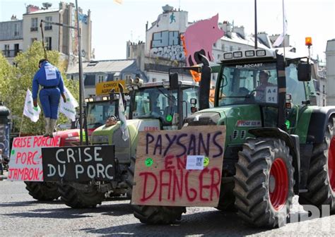 Photo: French farmers protest with tractors on the streets of Paris - PAR20100427715 - UPI.com