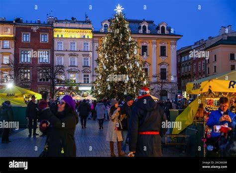 Traditional Christmas market and Christmas Tree at the Main Square in Krakow, Poland. December ...